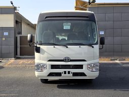 
										TOYOTA COASTER DIESEL 4.0 MT – AUTO DOOR – 23 SEATER – 3 POINT BELT – 2025 MODEL – WHITE full									