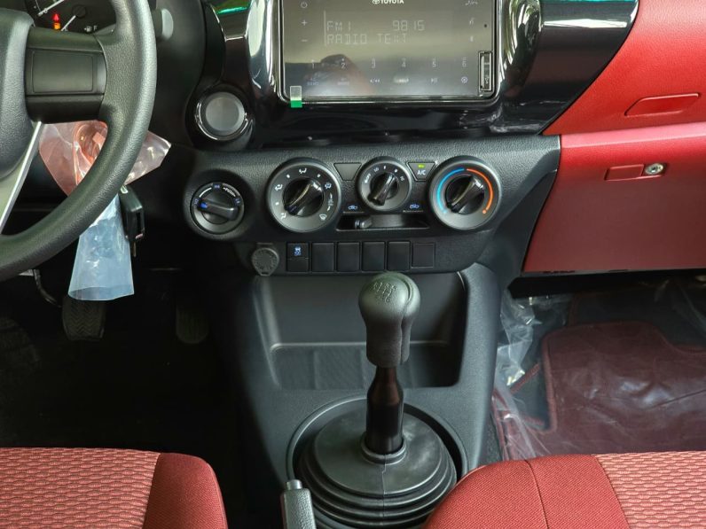 TOYOTA HILUX DIESEL 2.4 NARROW – M/T – BASIC – MANUAL WINDOWS – 2025 MODEL – WHITE INSIDE RED – OMANI